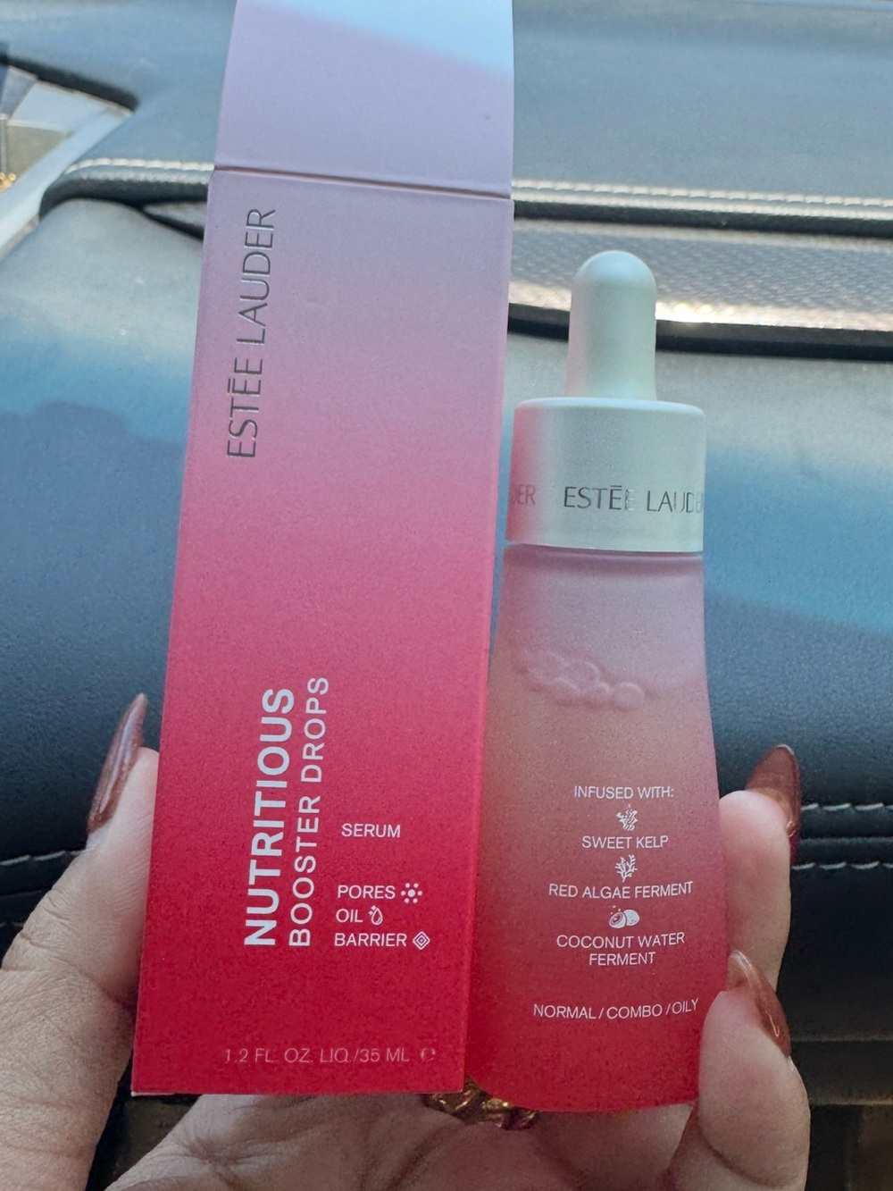 Estée Lauder Nutritious Booster Drops Serum in Pink Gradient and MAC serum
